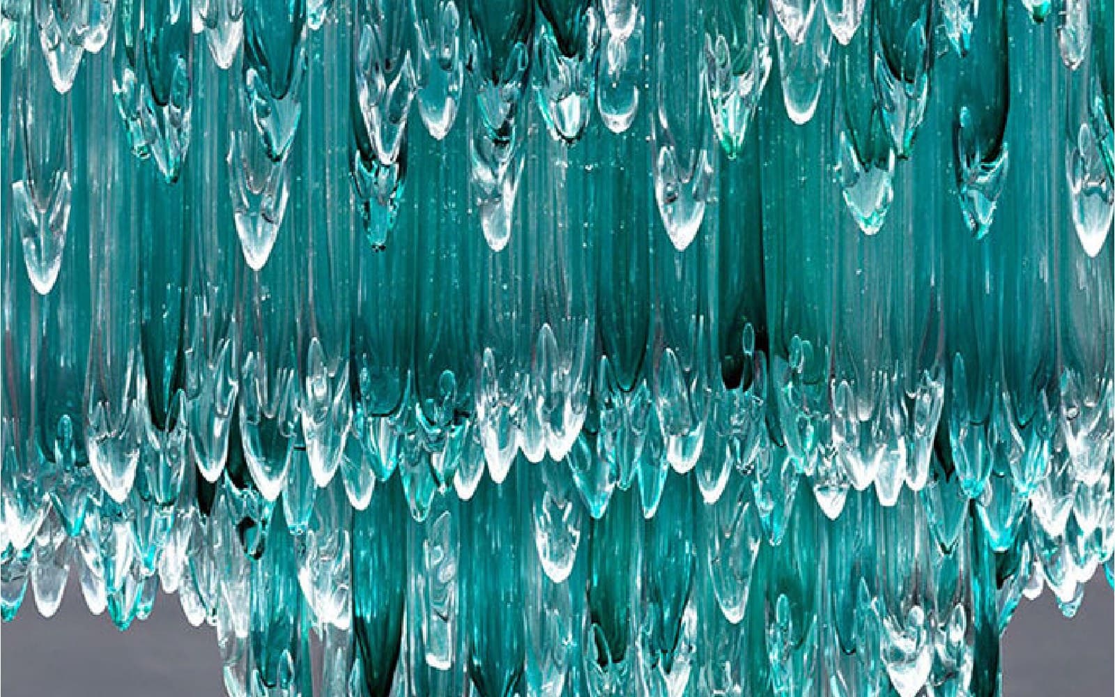 Cropped glass decorative lighting detail with aqua-toned glass elements.