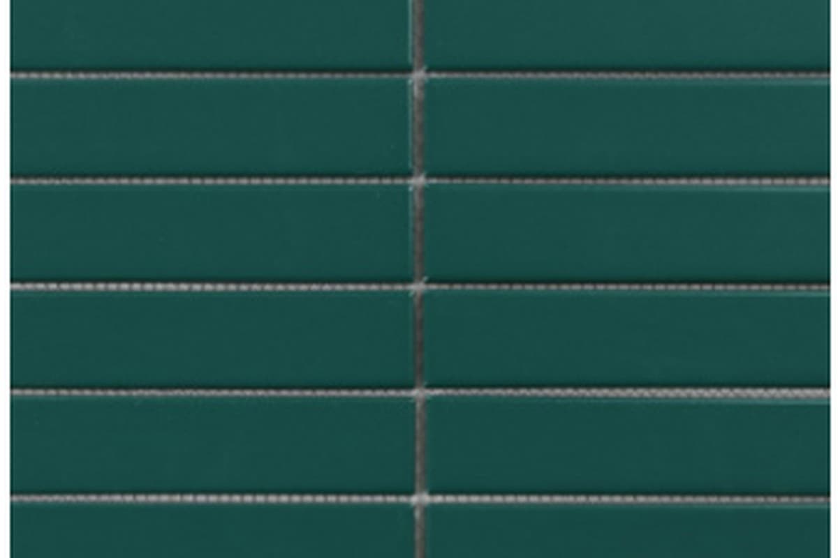 Green rectangular mosaic ceramic tile surface.
