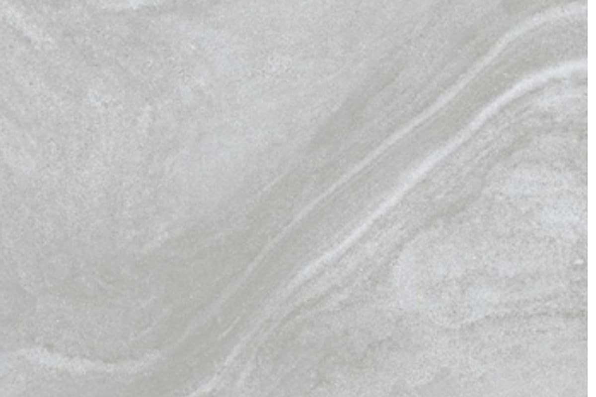 Grey porcelain tile surface with soft stone-like movement.