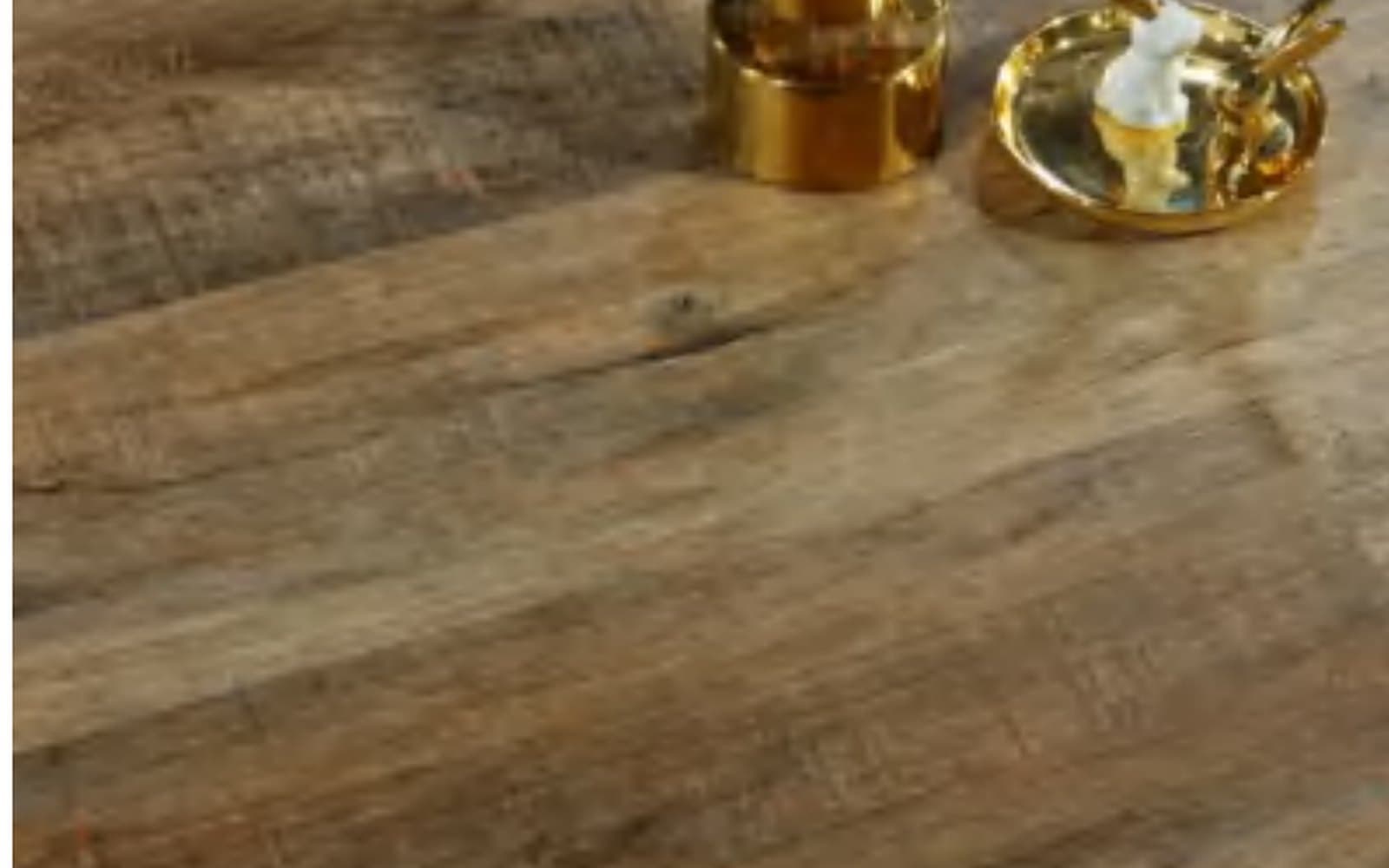 Close-up wood-look SPC flooring plank surface reference.
